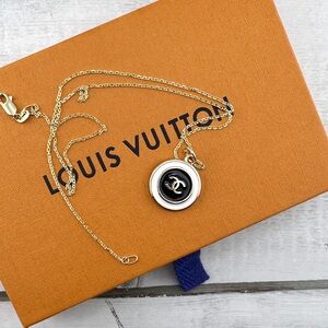 CHANEL Gold and Black Circular Necklace